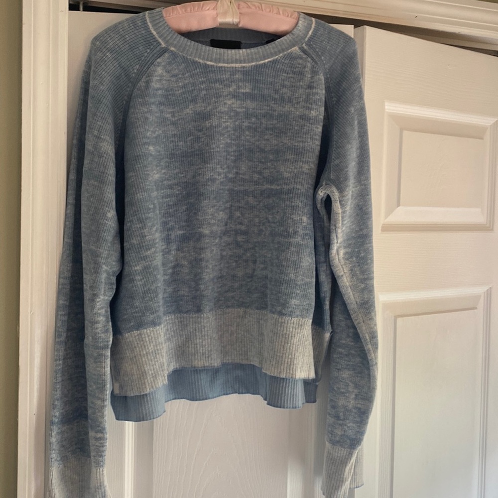 ATM light blue sweater with round neck line and bell sleeves